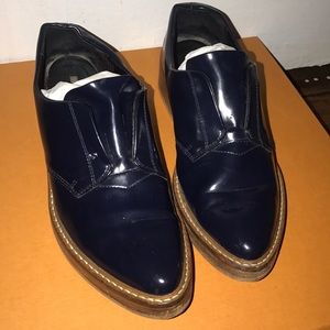 Navy blue oxfords.